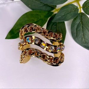 Body rhythm faux gold closable bracket with change and faux gem designs
